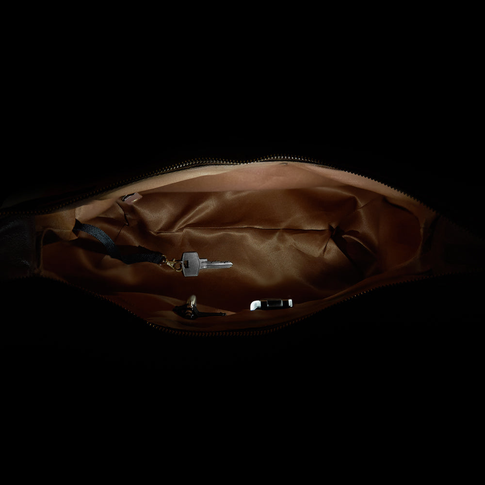 Hobo bag with LED light compartment